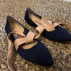 Navy blue and pink woman’s Rothy’s